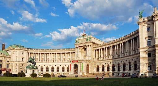 Building of the Austrian National Library under picturesque cloudy sky Hofburg complex Vienna Austria