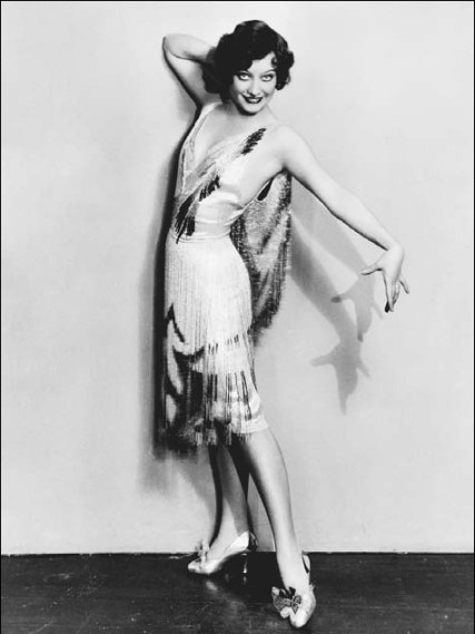 Joan-Crawford-models-a-flapper-dress